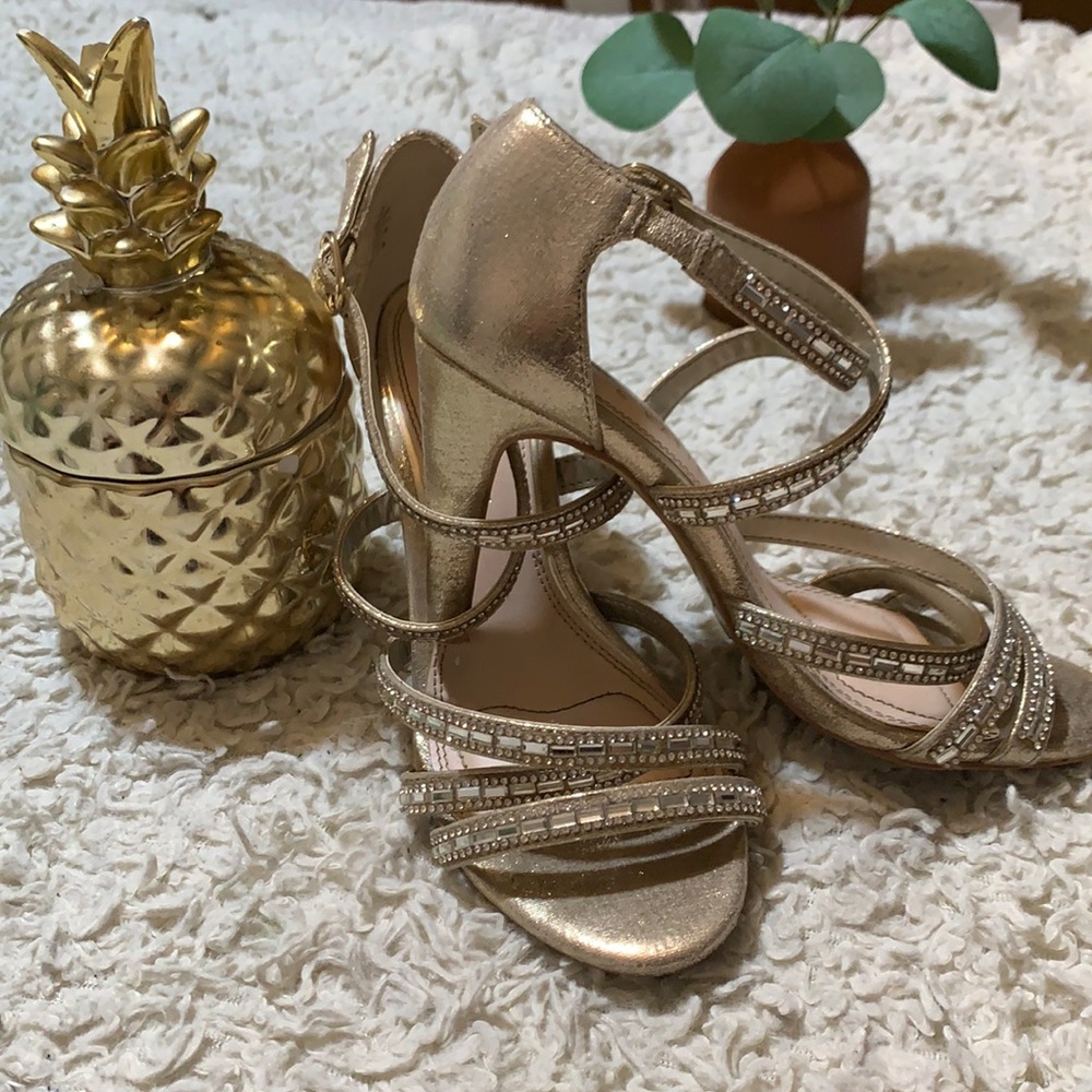 Golden high heels shoes